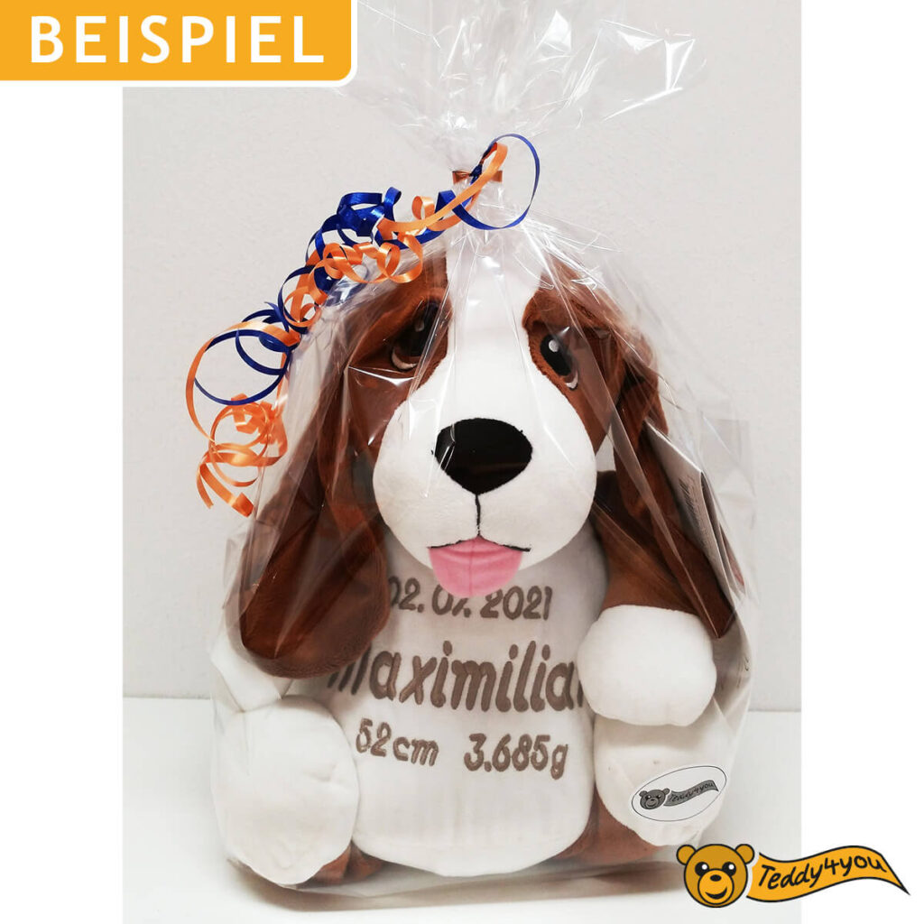 Kuscheltier mit Name als Geschenk verpackt