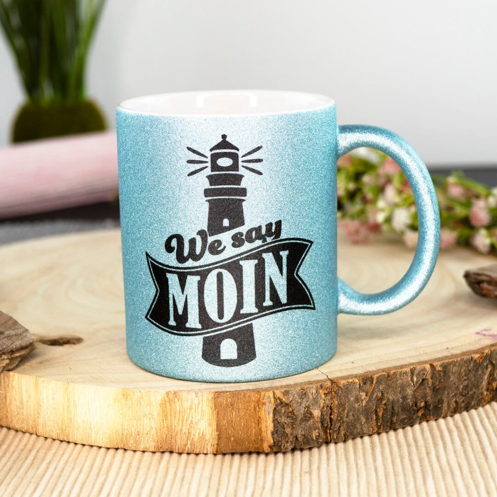Hellblaue Glitzertasse mit Motiv